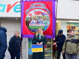 Cynon Valley MP Beth Winter showing solidarity with our banner in Pontypridd